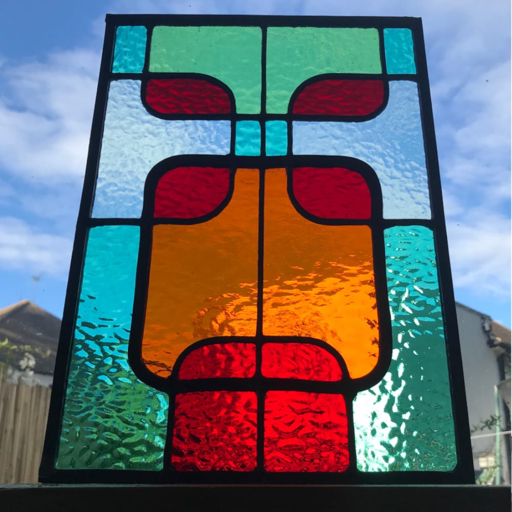 stained glass piece with art deco design