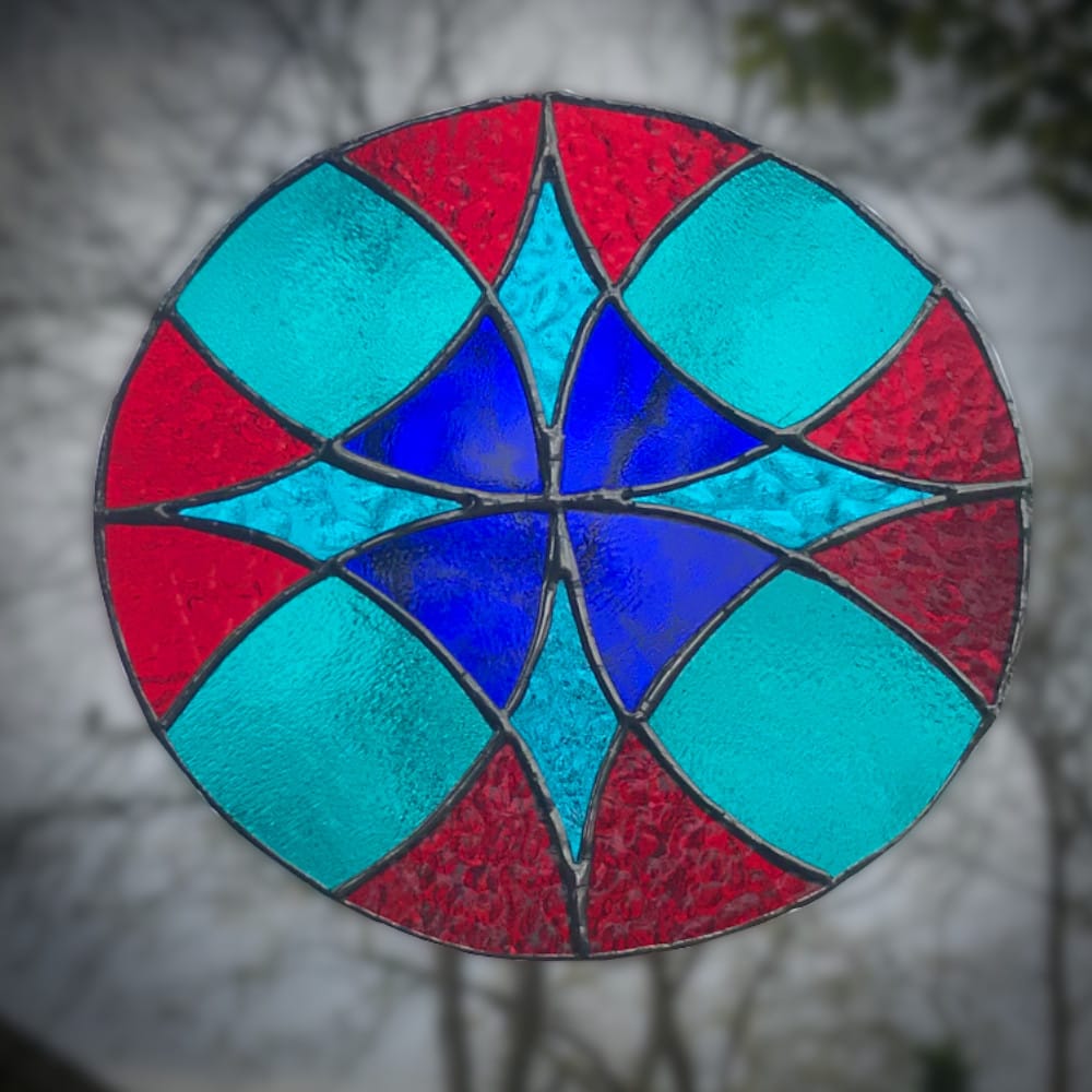 stained glass circle with flower design