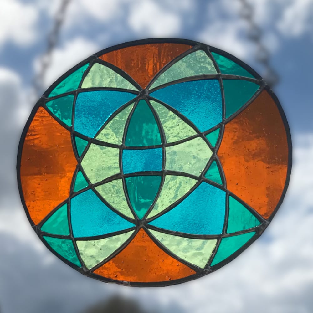 stained glass circle with arcs design